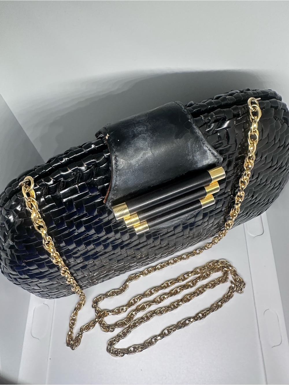 Black Woven Leather Crossbody Bag with Gold Chain
